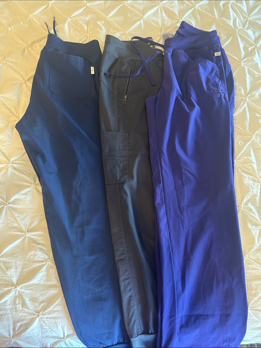 Lot of scrub pants and 1 top size small